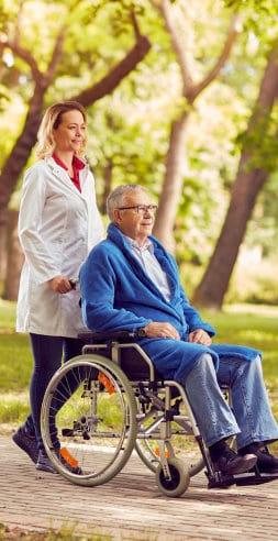 caregiver assisting her patient